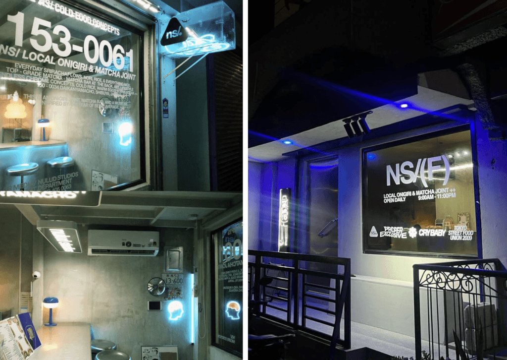 modern, neon-lit onigiri and matcha joint with an industrial aesthetic, featuring sleek signage, ambient blue lighting, and a cozy seating area decorated with unique stickers and artistic elements.